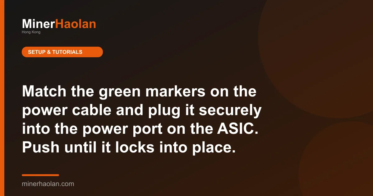 Match the green markers on the power cable and plug it securely into the power port on the ASIC. Push until it locks into place.